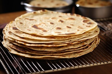 Sticker - golden-brown cooked tortillas on a cooling rack