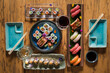 Set of various sushi with wine and chopsticks