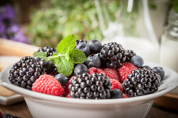 Wall Mural - Mix of berries in a bowl.