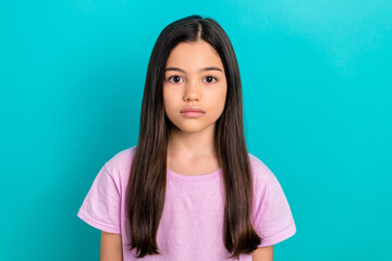 Wall Mural - Photo of positive good mood small kid wear pink t-shirt smiling isolated turquoise color background