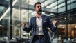 © mimadeo - energetic business man shouting and yelling with arms up celebrating victory