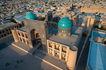 Wall Mural - Top view of the old Mir-i-Arab madrasah on a sunny September evening. Bukhara