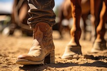 A Cowboy Boot On A Dirt Ground With Horses In The Background  .Generative AI