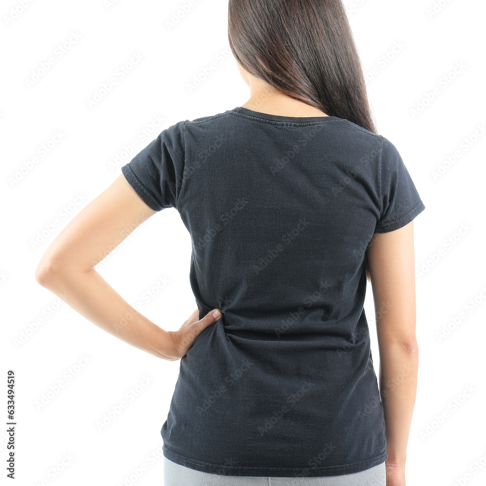 Young woman in black t-shirt on white background, back view