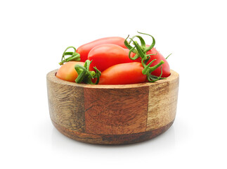 Fresh ripe organic red tomatoes in bowl from mango wood isolated on white background