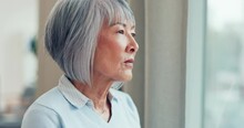Thinking, Senior And Woman With Memory At Window Or Checking Rain In Home For Retirement With Asian. Vision, Worry And Remembering With Elderly Female For Decision And Insurance In Apartment.