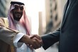 © Bojan - Arab businessman shaking hands with his European business partner outdoors. Making deal and new partnership.