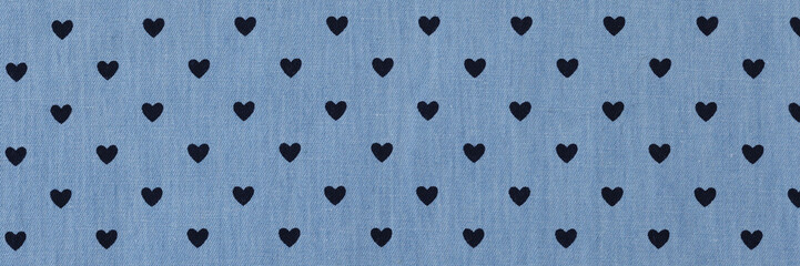 Wall Mural - Blue fabric with hearts pattern as background.