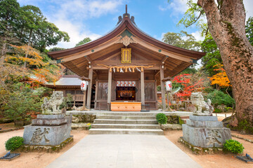 Sticker - Fukuoka, Japan - Nov 30 2022: Homangu Kamado shrine located at Mt. Homan, venerated from ancient times as a sacred mountain, the shrine probably the inspiration for Kimetsu no Yaiba: Demon Slayer