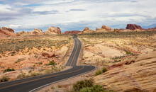 Valley of Fire State Park Nevada, USA. Empty curvy highway, desert, red rocky formation.