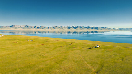 View from above of Song Kul - high alpine lake in the Tian Shan Mountains of Kyrgyzstan