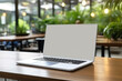 © AI_images - Laptop pc mock up template design on office workplace desk, white mockup empty blank computer screen on office work table business web technology at modern workspace, closeup