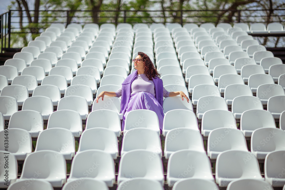 Mpty Woman Seats of tribune on sport stadium. Concept of fans, chairs for ...