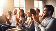 © Unique Creations - Conference, team of coworkers clapping hands for success of presentation  Support, achievement and diverse group of people applauding together in business meeting.