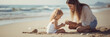 © wolfhound911 - Mother and daughter playing on the beach