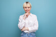 © Ivan Traimak - young pretty blond office worker woman in a white shirt and jeans. people lifestyle concept