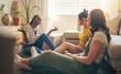 © Davids C/peopleimages.com - Happy, gossip and friends on a floor relax, talking and bond with advice in house together. Conversation, drama and women with diversity in a living room speaking, chilling and enjoy weekend freedom