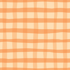 abstract checkered seamless pattern with orange brush strokes, stripes on yellow background for autumn, halloween prints, wrapping paper, scrapbooking, wallpaper, backgrounds, etc. EPS 10