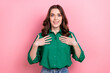 Photo of impressed funky lady wear green shirt arms chest smiling isolated pink color background