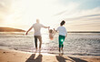 © Ramba/peopleimages.com - Dad, mom and swing girl on beach, holiday and vacation in Florida for bonding, adventure and family together in waves. Mother, father and child at sunset in ocean, sea or playing in water for fun