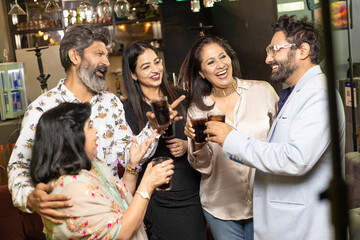 Poster - Indian people enjoying party at restaurant