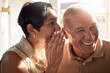 © aLListar/peopleimages.com - Elderly couple, gossip and laugh in retirement home from secret and conversation with smile. Did you know, drama and marriage with senior people together with story talk and listening in a house