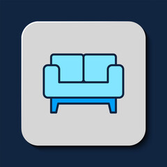 Canvas Print - Filled outline Sofa icon isolated on blue background. Vector