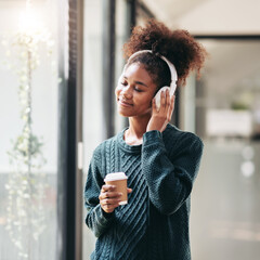 Poster - African american student woman wearing sweater and headphones to listening the music and drinking coffee