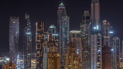  Skyscrapers of Dubai Marina near Sheikh Zayed Road with highest residential buildings all night timelapse