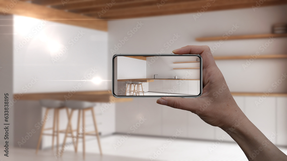 Hand holding smart phone, AR application, simulate furniture and ...