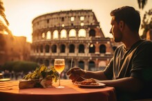 Taste Of Italy. Savoring A Delectable Plate Of Spaghetti With Tomato Sauce And Basil In A Charming Roman Café With The Colosseum As A Backdrop. Culinary Experience 