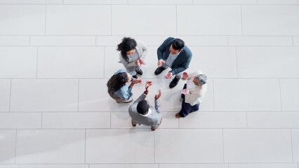 Wall Mural - Above, motivation and hands of business people with applause as team building, teamwork and support together as group. Collaboration, huddle or circle of success by winning employees in celebration