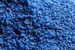 Blaues Kunststoff Granulat. Plastik Rohstoff zum Einschmelzen zur Herstellung von Produkten.