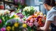 © ThisDesign - florist arranging a bouquet in a fragrant flower shop generative ai