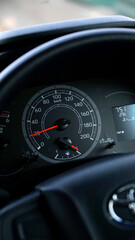 car dashboard with speedometer, slow speed 20 km/hour