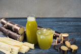 Fototapeta Zwierzęta - Fresh squeezed sugar cane juice