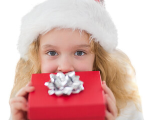 Wall Mural - Digital png photo of caucasian girl with christmas present on transparent background