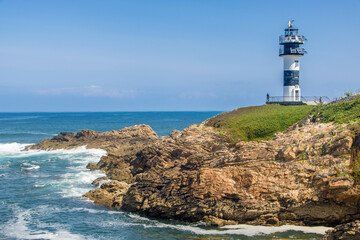 Wall Mural - The lighthouse at isla Pancha in Galicia