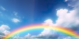 Fototapeta Tęcza - Rainbow in the Bright Blue Sky. AI Generative