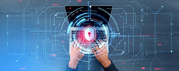Poster - Top view hands typing on laptop, digital lines and cybersecurity shield hologram