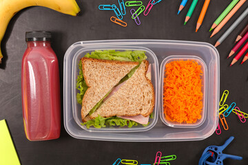 Wall Mural - healthy lunch box with sandwich,  vegetable and fruit juice