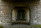 Fototapeta Do przedpokoju - Stone archway in medieval castle. Ancient wall with arc of Akershus Castle in Oslo.
