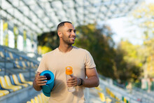 Portrait Of Sportsman With Bottle Of Water, Man Resting Walking Stadium For Training, Young Athlete Yoga And Fitness Trainer