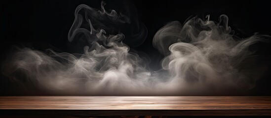 Poster - Wooden table with smoke on dark background Ideal for showcasing products
