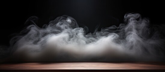 Wooden table with smoke on dark background Ideal for showcasing products