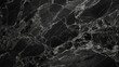 © E  - Heavily veined black granite texture.