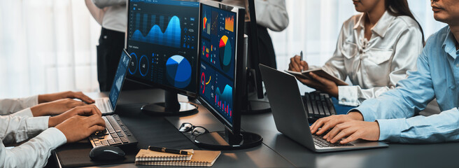 Poster - analyst working on data analysis or bi dashboard on computer monitor. business team analyzing financ