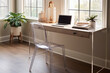 Craft a modern workspace with a standing desk, a clear acrylic chair, and ample natural light, fostering a bright and energizing environment for work.