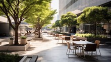 Outdoor Plaza Of A Contemporary Downtown Office Building Outdoor Seating And Tables And Chairs With Landscaping Natural Grasses And Trees Small Stand Alone Coffee Shop