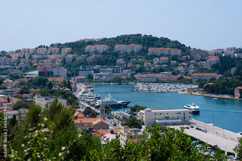 Beautiful view of the city of Dubrovnik in Croatia. Old Croatian town, marina, houses with red clay roofs